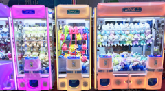 新款豪华互联网英伦风抓娃娃机迷你夹公仔机扭蛋机剪刀娃娃机